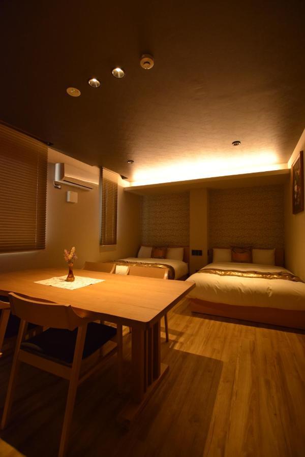 Grand Base Beppu Ekimae Aparthotel Quarto foto
