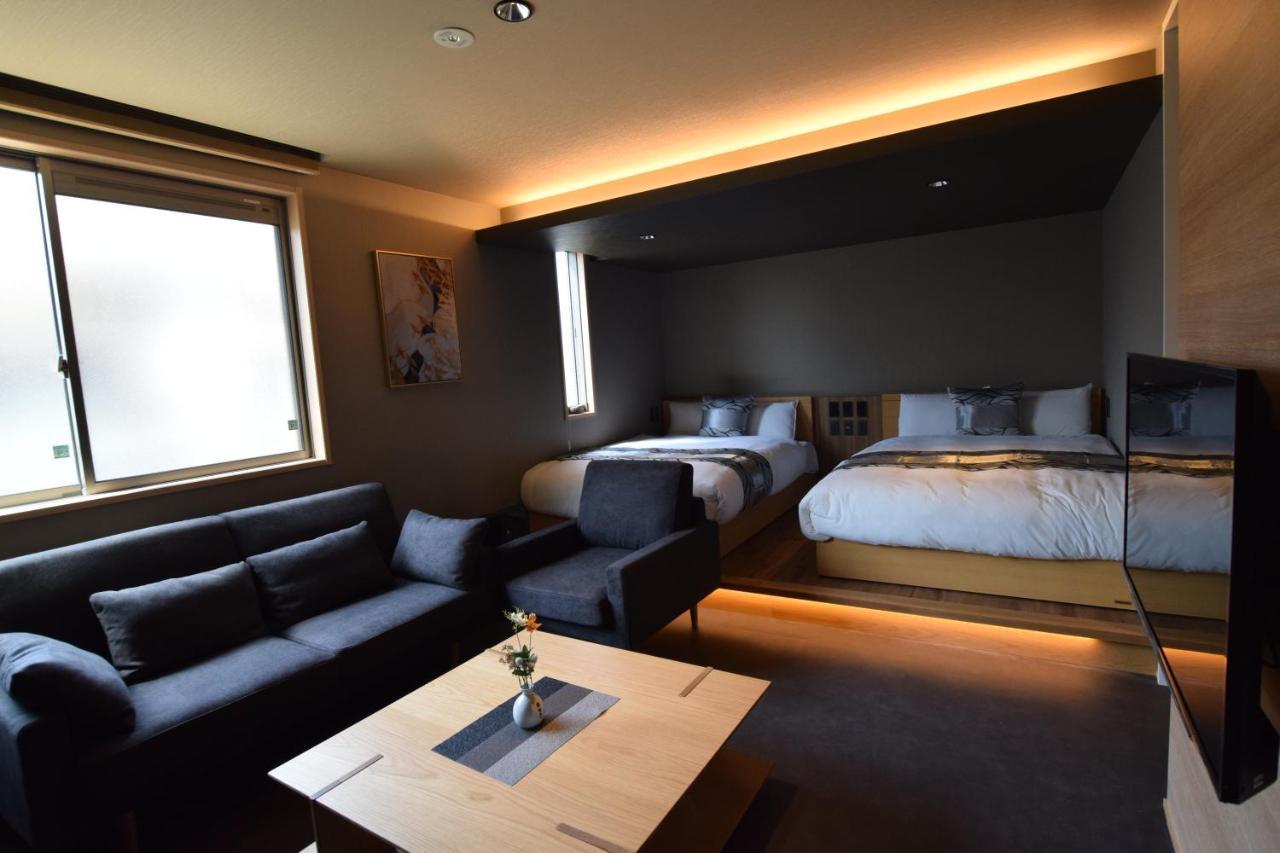 Grand Base Beppu Ekimae Aparthotel Exterior foto
