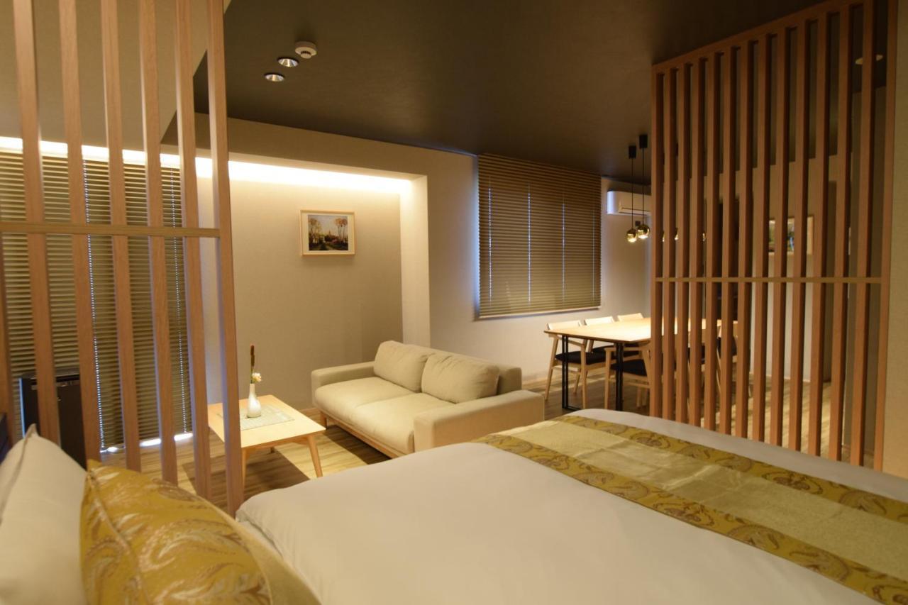 Grand Base Beppu Ekimae Aparthotel Exterior foto