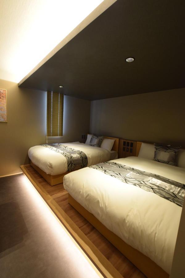 Grand Base Beppu Ekimae Aparthotel Exterior foto