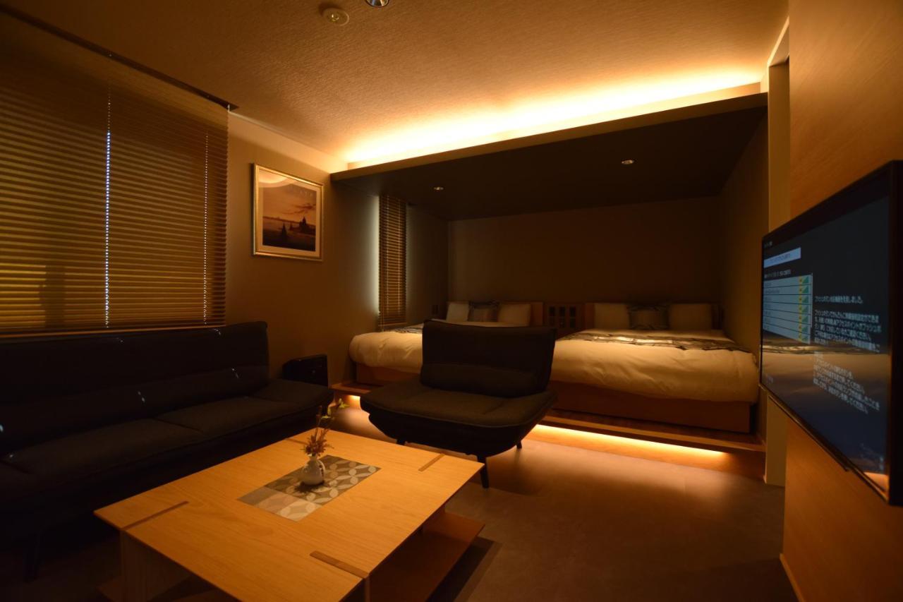 Grand Base Beppu Ekimae Aparthotel Exterior foto