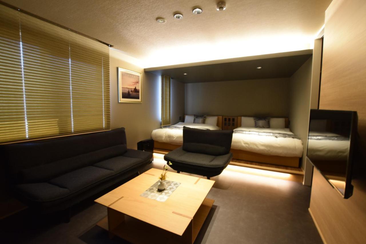 Grand Base Beppu Ekimae Aparthotel Exterior foto